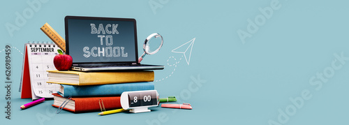 Fotografia Back to school concept with laptop and books on blue background with copy space