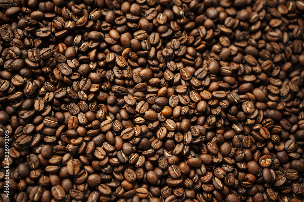 Roasted Coffee Beans Background Texture, Cafe and Refreshing Beverage for Cover or Wallpaper.
