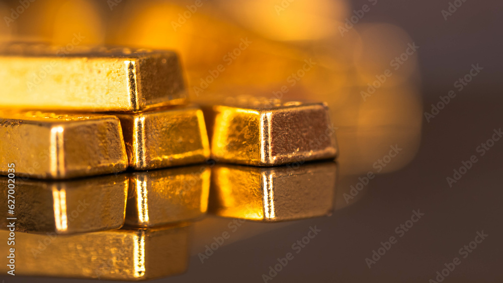 gold bars place on the phone that opens the candlestick chart. Fluctuations in gold prices concept. gold bars place on the phone that opens the candlestick chart. Fluctuations in gold prices concept.