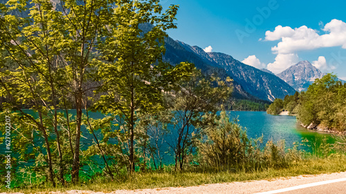 Alpine summer view with reflections near Lake Plansee, Reutte, Tyrol, Austria