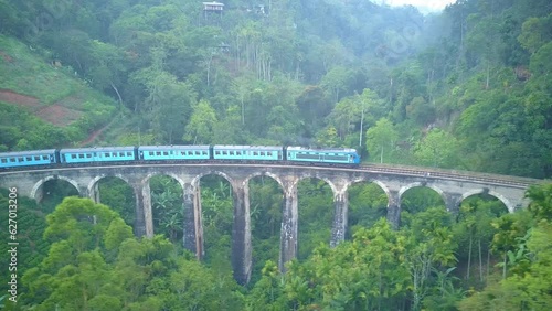 Railway Train over 9 Arches Bridge - Sri Lanka photo