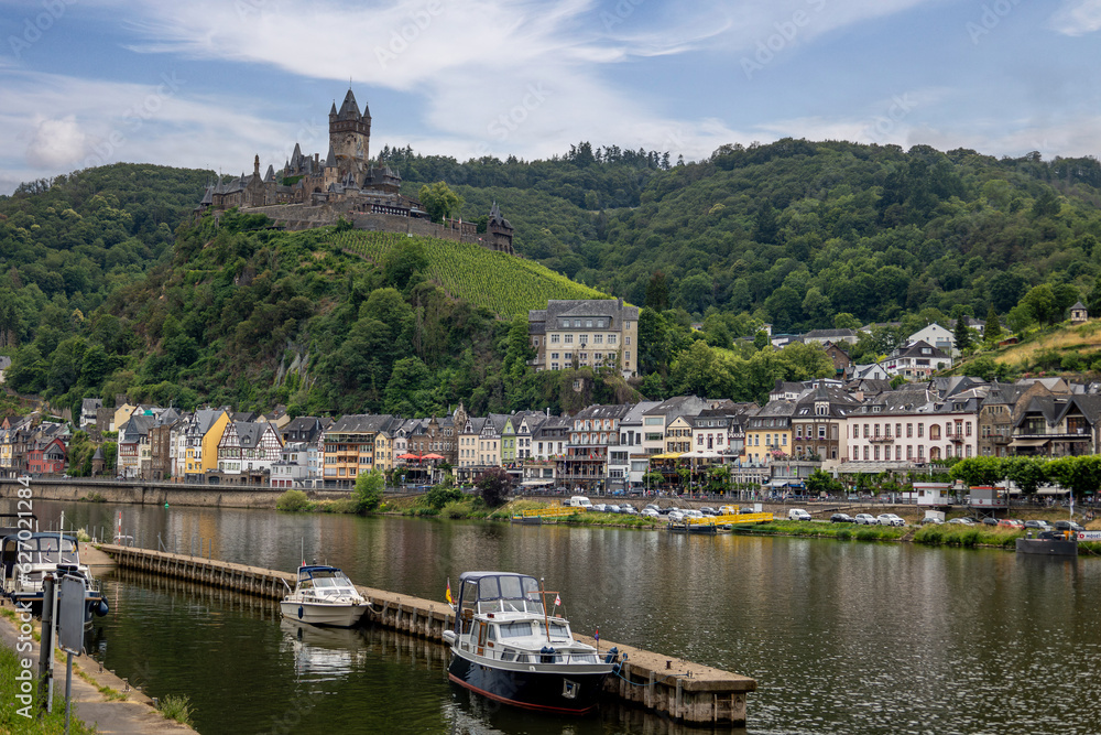 View on the German city of Cochem with the colored houses and the Reichsburg Cochem castle