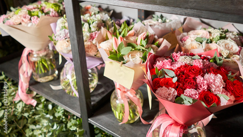 Ready-made bouquets for sale. Many different flowers on Showcase. Background of mix of flowers. Beautiful flowers for catalog or online store. Floral shop and delivery concept. © malkovkosta