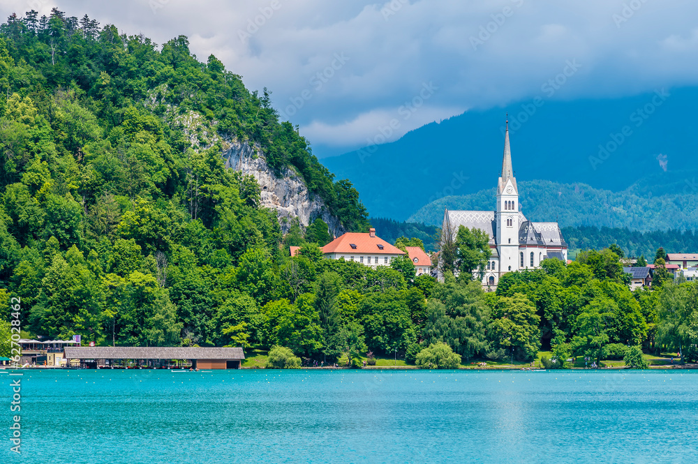 A view towards the church on the the shore of Lake Bled in Bled, Slovenia in summertime