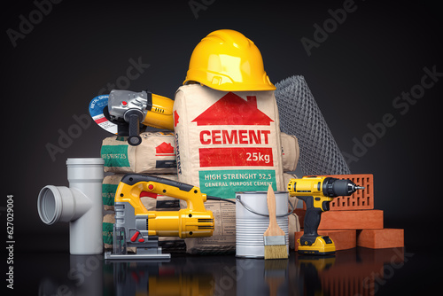 Construction materials and tools on black background. photo