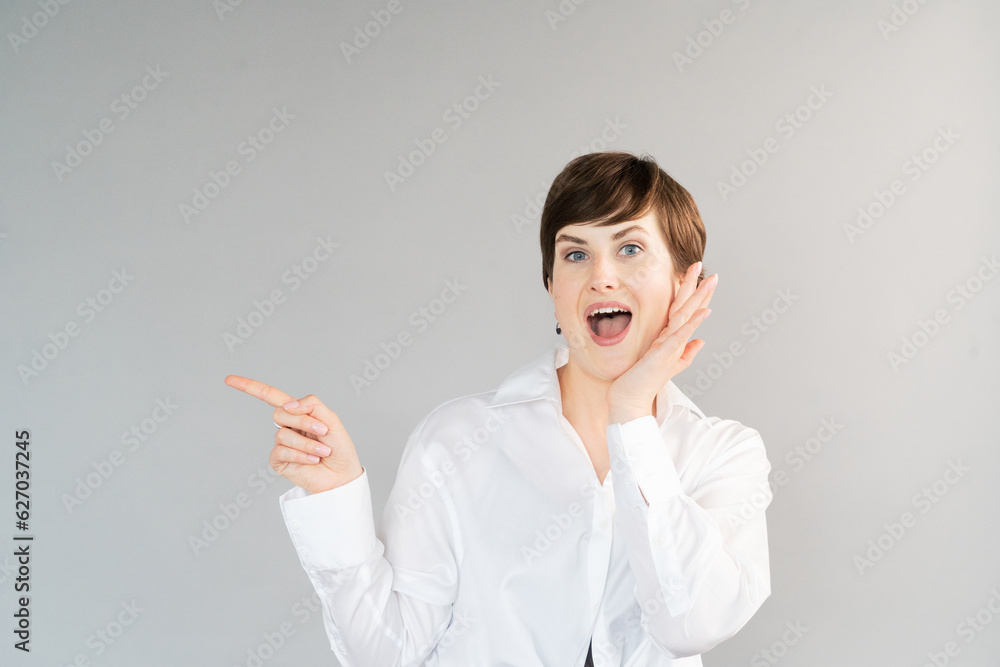Happy young girl isolated over gray background Happy young girl isolated over gray background