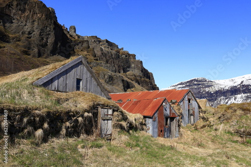 View of an abandoned house in the village of Kalfafell located in the south of Iceland photo