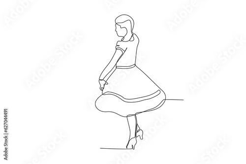Side view of a woman dancing. Fiestas patrias chile