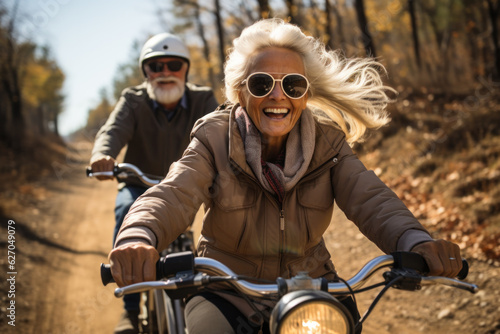 Senior couple riding bike enjoying their retirement.