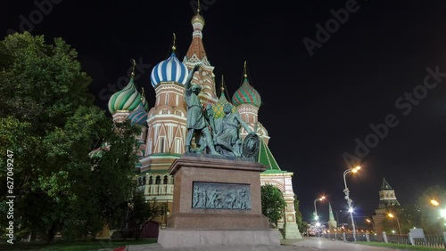 St. Basils cathedral and illuminated monument to Minin and Pozharsky at night on Red Square timelapse hyperlapse in Moscow, Russia