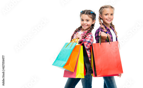 teen children go shopping. girls with shopping bags. shopping sale and discount. teen children girls with bags. Exploring boutiques and department stores. copy space