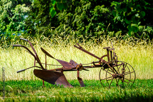 old plow at a farm photo