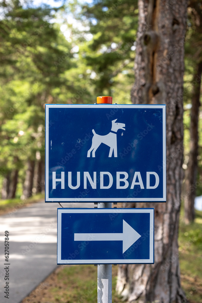 Sundbyholm, Sweden A sign allowing dogs to bathe in Lake Malaren says in Swedish, Dog Bath, in English translation. Sundbyholm, Sweden A sign allowing dogs to bathe in Lake Malaren says in Swedish, Dog Bath, in English translation.
