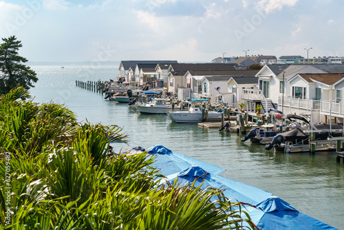 Waterway in Ocean City lined with small houses and boats