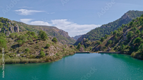 Reservoir at full capacity. Aerial view of a water reserve for human use. Water reserves for human consumption. Andalusia. Spain. © Siroco Drones