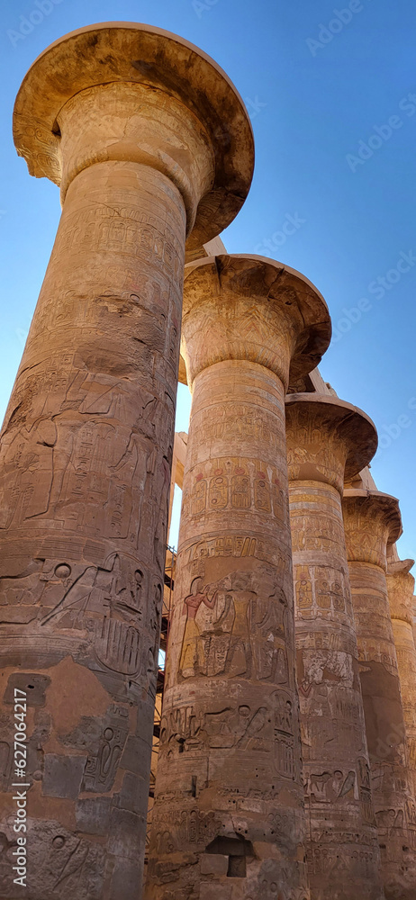 Columns of hypostyle room ceiling with Egyptian hieroglyphics. Karnak temple. Luxor. Egypt Columns of hypostyle room ceiling with Egyptian hieroglyphics. Karnak temple. Luxor. Egypt