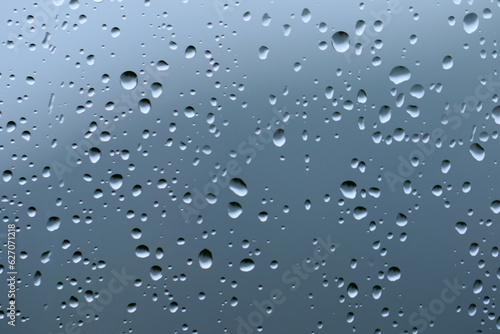 Wallpaper Mural Rain drops on the surface of a window glass in a rainy day Torontodigital.ca