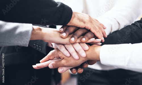 Business people  meeting and hands together for teamwork  unity or collaboration at the office. Hand of group touching for team agreement  motivation or support in trust  solidarity or integration