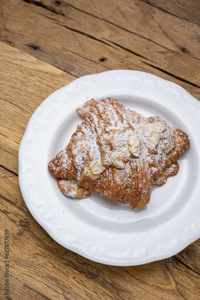Delicious flavored pastries on a wooden table. Close up Delicious flavored pastries on a wooden table. Close up