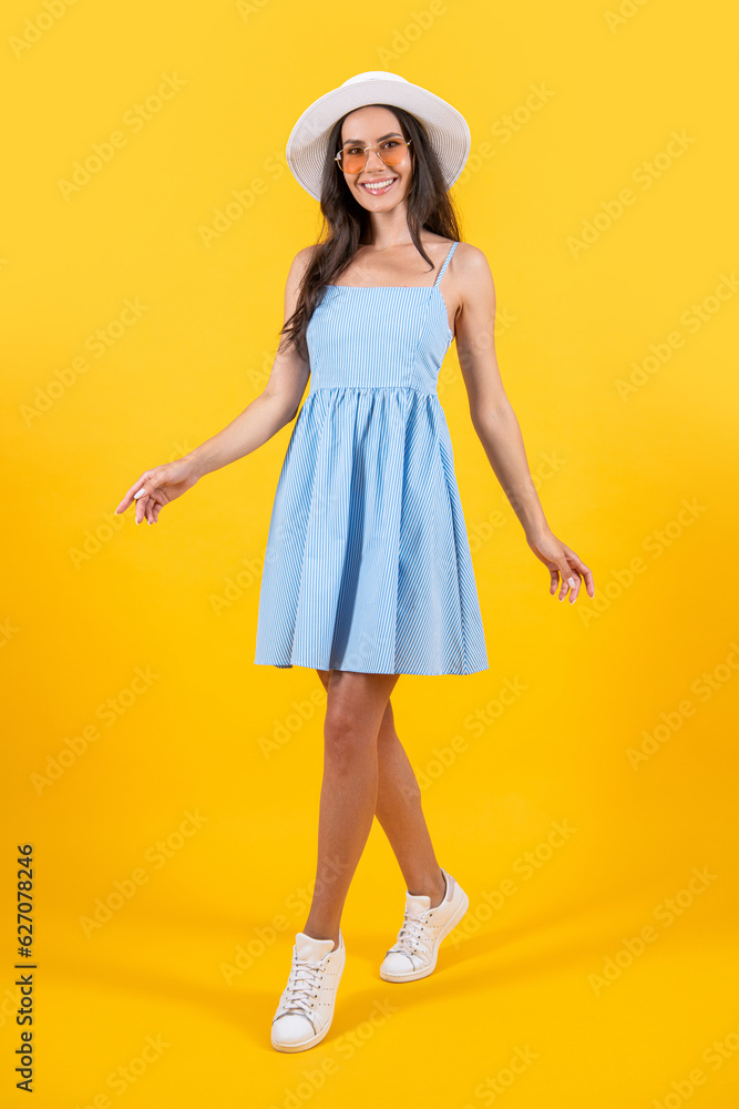 carefree woman in summer dress at studio. woman in summer dress on background. carefree woman in summer dress at studio. woman in summer dress on background.