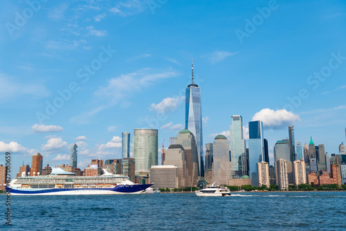 Cruise ship sailing next Manhattan in New York. Skyline of New York Manhattan cruising on the Hudson River cruise liner . Vacation on cruise liner.