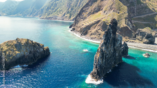Aerial view of tall lava rocks in ocean, islet towers in Ribeira da Janela, Madeira, Portugal photo