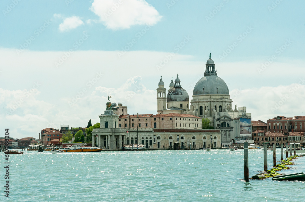 Front view, far distance of, domed buildings, on grand canal waterfront, in Venice, Italy