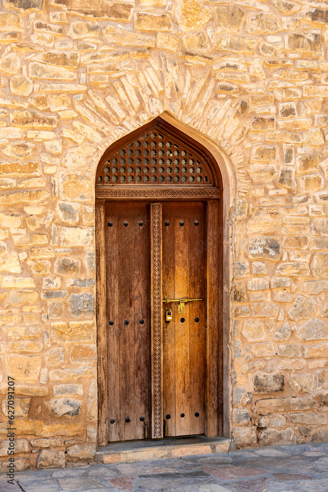 old wooden door in Sur, Oman