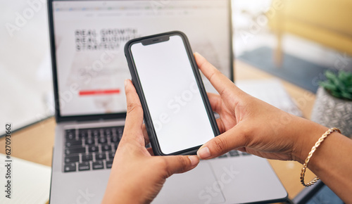 Hands, phone and mockup with a woman in her home for research, communication or remote work as a freelance employee. Mobile, networking or ecommerce with a female entrepreneur working in a house © Bettencourt/peopleimages.com