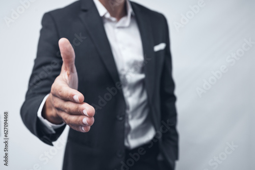 Businessman, handshake and meeting for hiring, b2b or deal in welcome, greeting or introduction on mockup. Man, CEO or executive shaking hands for recruiting, partnership or agreement at office