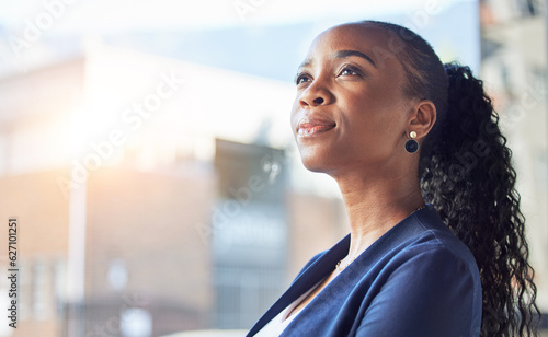 Office professional, face and thinking black woman, bank consultant and brainstorming plan, ideas or strategy. Window, problem solving and business person planning corporate choice, job or future