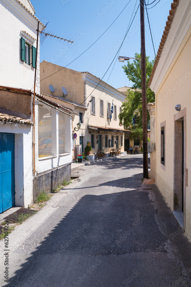 Street with old buildings in Lakones village, Corfu, Greece