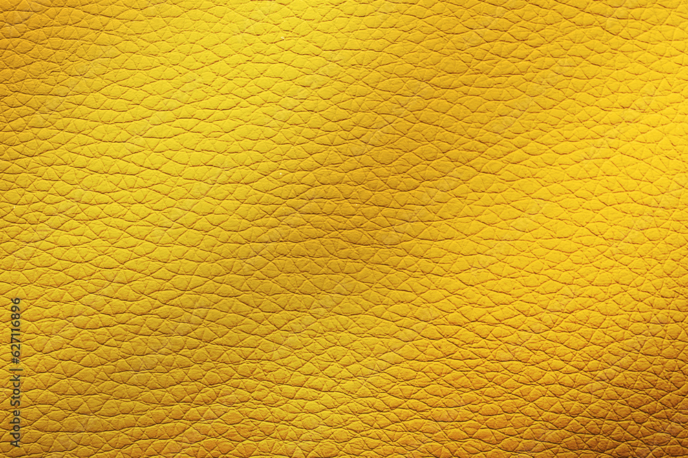 Naklejka premium Golden textured surface as background, closeup view