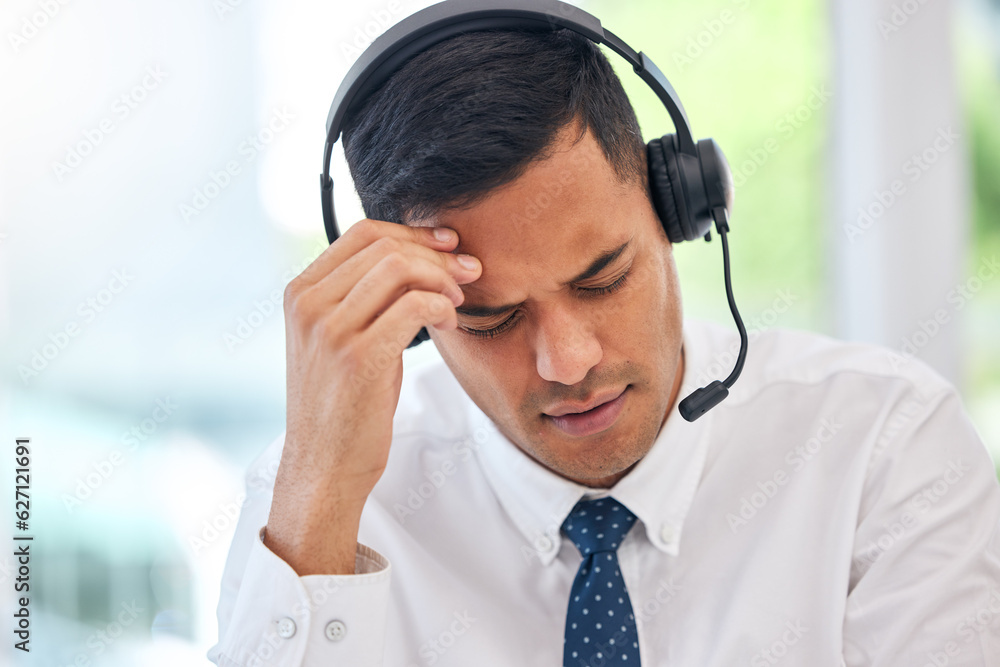 Call center, customer service and man with a headache or businessman with stress, burnout or working with fatigue. Tired, exhausted or consultant in office with a migraine, pain or anxiety from crm Call center, customer service and man with a headache or businessman with stress, burnout or working with fatigue. Tired, exhausted or consultant in office with a migraine, pain or anxiety from crm