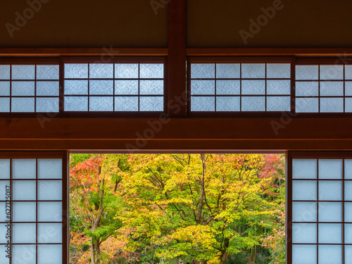 Interior of traditional Japanese house with a view of autumn garden