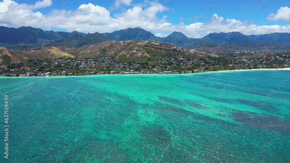 Drone shot: Kayakers paddle to Lanikai, Oahu, HI. 4K30 Aerial Shot. Drone shot: Kayakers paddle to Lanikai, Oahu, HI. 4K30 Aerial Shot.