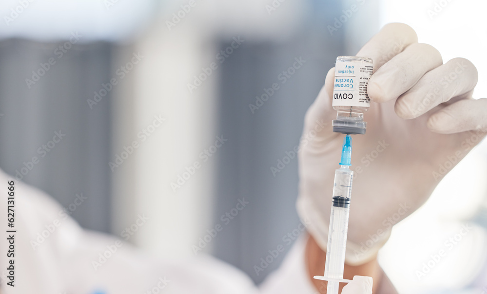 Doctor, hands and syringe for covid vaccine, virus and pharmacy medicine, hospital or clinic service. Medical, compliance or healthcare professional or nurse with needle and corona virus glass bottle Doctor, hands and syringe for covid vaccine, virus and pharmacy medicine, hospital or clinic service. Medical, compliance or healthcare professional or nurse with needle and corona virus glass bottle