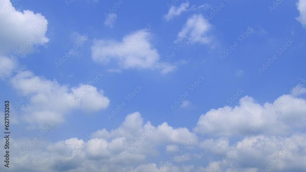Blue sky with fluffy cloud time lapse on a sunny day 4k footage. Blue sky with fluffy cloud time lapse on a sunny day 4k footage.