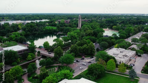 Phenomenal aerial Naperville Illinois - Centennial Beach in the summer and Millennium Carillon, Rotary Park Sled Hill, Moser Tower, Naperville Riverwalk in DuPage County photo