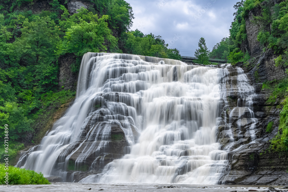 Summer image of Ithaca Falls at Fall Creek, in Ithaca NY. Summer image of Ithaca Falls at Fall Creek, in Ithaca NY.