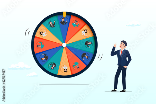 Businessman HR staff picking candidate by lucky draw wheel, choosing candidate, hiring new headcount or applicant, lucky winner staff, human resources pick new talent or layoff employee (Vector)