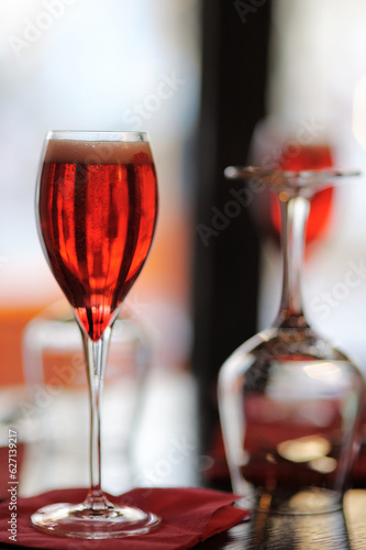Glass with French alcohol drink Kir Royal