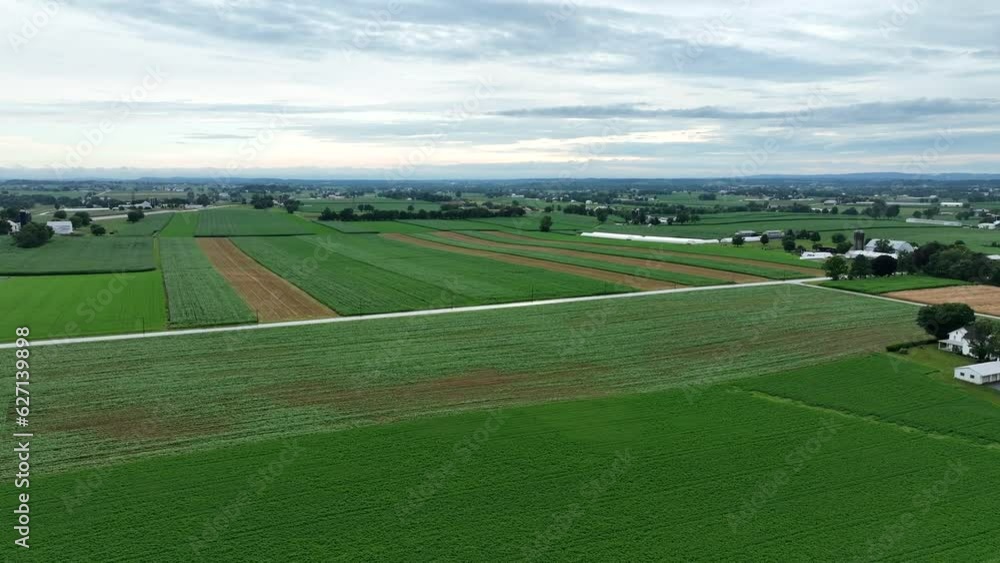 An aerial view of the lush green farmland of Lancaster County Pennsylvania after a summer thunderstorm. An aerial view of the lush green farmland of Lancaster County Pennsylvania after a summer thunderstorm.