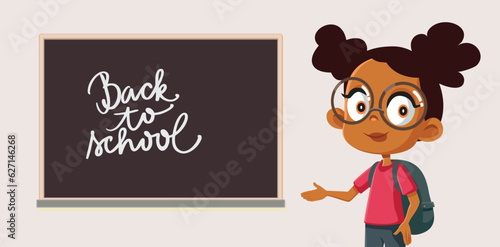 School Girl Standing next to a Blackboard Vector Cartoon illustration. Cheerful little student presenting new school year beginning 
