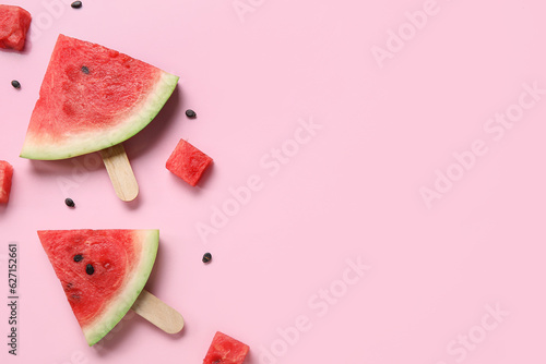 Composition with tasty watermelon sticks on pink background
