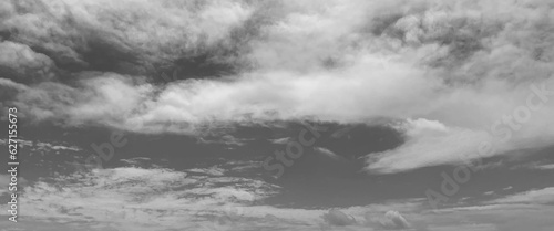 Panorama view of overcast sky, dramatic gray sky and white clouds before rain in rainy season, cloudy gray sky with thick dense clouds,  sky with storm clouds dark, The dark sky with heavy clouds.
