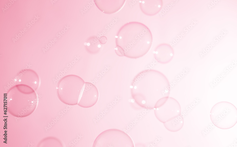 Beautiful Transparent Pink Soap Bubbles Floating in The Air. Abstract Fun Background. Circles, Bubbles Blurred. Refreshing of Soap Sud and Bubbles Water. Beautiful Transparent Pink Soap Bubbles Floating in The Air. Abstract Fun Background. Circles, Bubbles Blurred. Refreshing of Soap Sud and Bubbles Water.