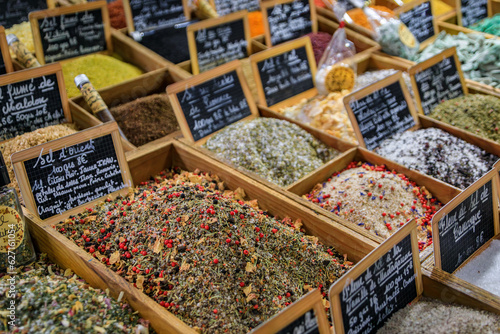 Fotografie Exotic flavored salts with herbs and spices for sale at a local covered provenca