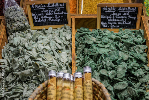 Sugar coated crystallized mint and verbena leaves, cocktail, ice cream and cheese garnish at a provencal farmers market in Antibes, South of France