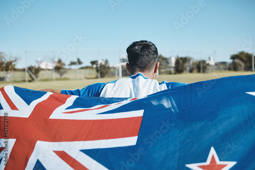 New Zealand flag, back and sports man with mockup space on blue sky outdoor. Aotearoa banner, national and athlete with patriotism, pride or representation to support country, motivation and sign